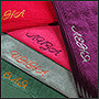 Machine embroidery of a name on a towel