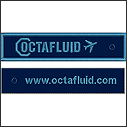 Созданные нами дизайны машинной вышивки для брелоков с логотипом Octafluid
