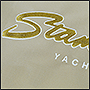 Фото вышивки золотом на чехле для яхты Stamas