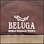 Вышивка на фартуке логотипа Белуга