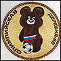 Machine embroidery of an Olympic bear on a robe