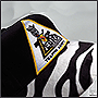 Фото вышивки на кепке Zebra и обтяжка козырька