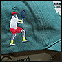 Фото вышивки теннисиста на боку кепки