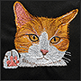 Машинная вышивка рыжего кота на крое