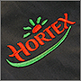 Фото вышивки логотипа Hortex на футболке