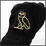 Machine embroidery in form of an owl on gloves