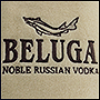 Вышивка на пледе логотипа Белуга