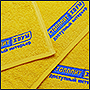 Фото вышивки логотипа Столплит на полотенцах