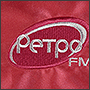 Фото вышивки на атласной ткани логотипа радио 