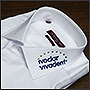 Фото вышивки на воротнике рубашки логотипа Ivoclar Vivadent