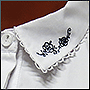 Машинная вышивка цветов на воротнике блузки