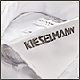 Фото вышивки логотипа Kieselmann на воротнике