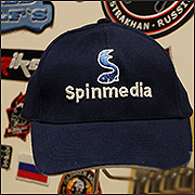 Готовая вышивка логотипа Spinmedia нитками Gunold