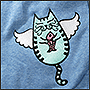 Оригинальная вышивка на одежде: летающая кошка с рыбкой