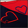 Фото вышивки сердечек на трикотажной одежде