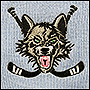 Фото вышивки хоккейной эмблемы на вязанном