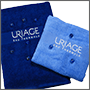 Вышивка логотипа Uriage на полотенцах