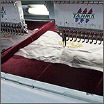 Вышивка на крое под подушку логотипа Avshar-Club